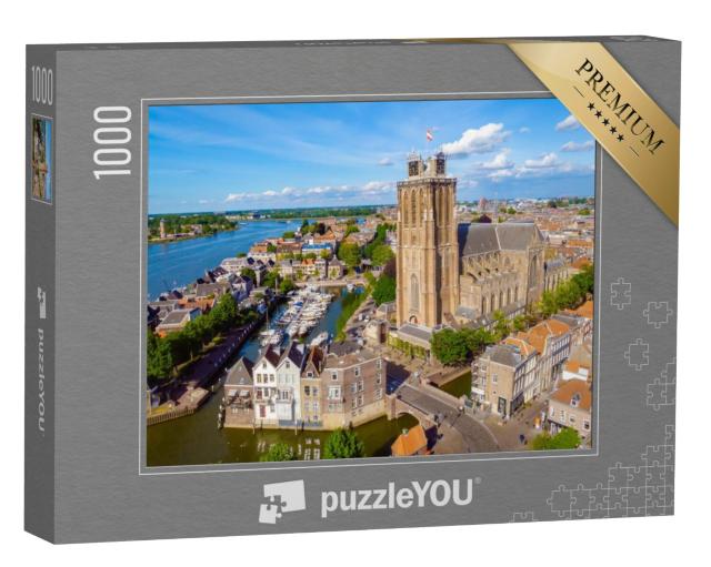 Puzzel 1000 stukjes „De skyline van Dordrecht met kerk en grachtenpanden in de Nederlandse Oude Maas“