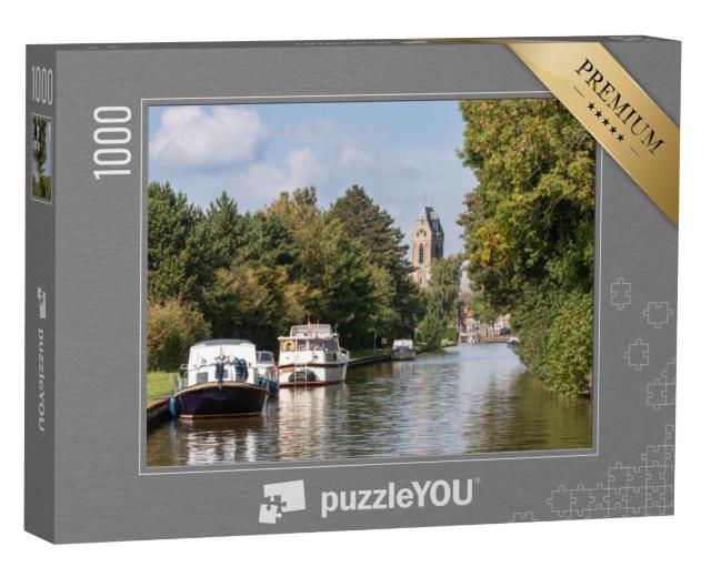 Puzzel 1000 stukjes „IJssel in het pittoreske Oudewater met de Sint-Michielskerk op de achtergrond“