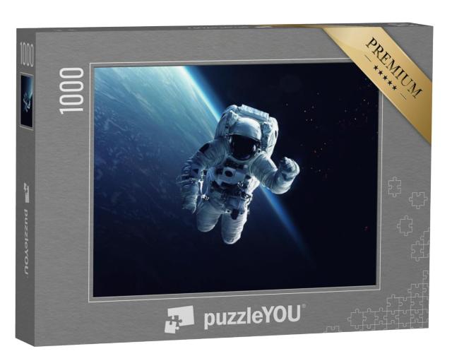 Puzzel 1000 stukjes „Astronaut tijdens een ruimtewandeling“