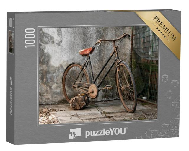 Puzzel 1000 stukjes „Oude roestige fiets voor een muur“