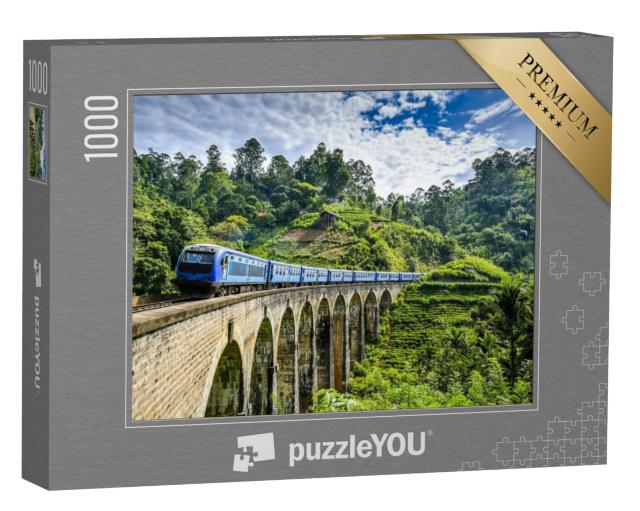 Puzzel 1000 stukjes „Spoorbrug op een groen berglandschap“