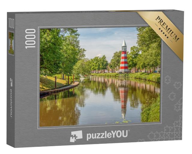 Puzzel 1000 stukjes „Stadsgezicht van Breda, een vuurtoren op de achtergrond“