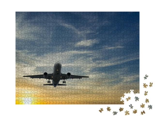 Puzzle 1000 Teile „Flugzeug vor dem blauen Himmel im Sonnenuntergang“