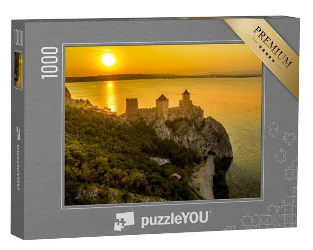 Puzzel 1000 stukjes „Silhouet van kasteel Golubac bij zonsondergang langs de Donau in Servië“