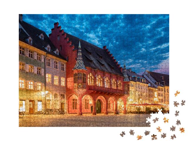 Puzzle 1000 Teile „Historisches Kaufhaus am Münsterplatz in Freiburg, Deutschland“