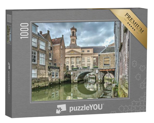 Puzzel 1000 stukjes „Kanaal met oude huizen direct aan het water in Dordrecht, Nederland“