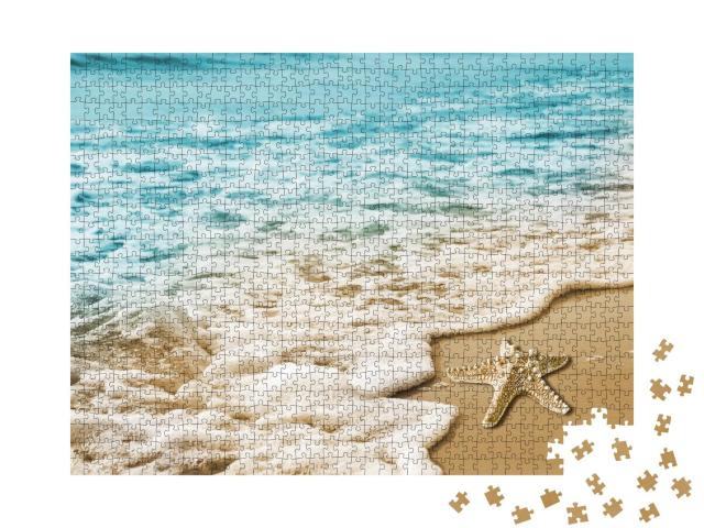 Puzzle 1000 Teile „Seestern in den weichen Wellen am Meeresufer“