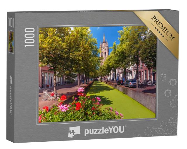 Puzzel 1000 stukjes „De Oude Delftse gracht en de scheve toren van de Oude Kerk in Delft, Zuid-Holland“