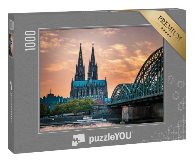 Puzzle 1000 Teile „Kölner Dom und Hohenzollernbrücke in Köln am Abend“