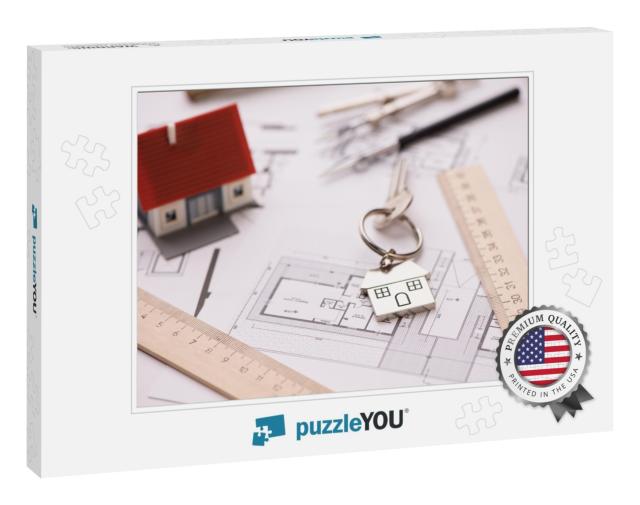 A Model House on Blueprints with Keys to the New H... Jigsaw Puzzle