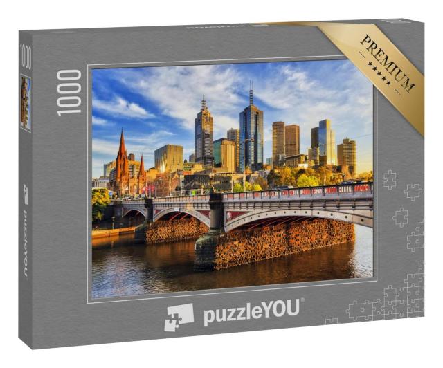 Puzzle 1000 Teile „Morgen über den Hochhäusern von Melbourne“