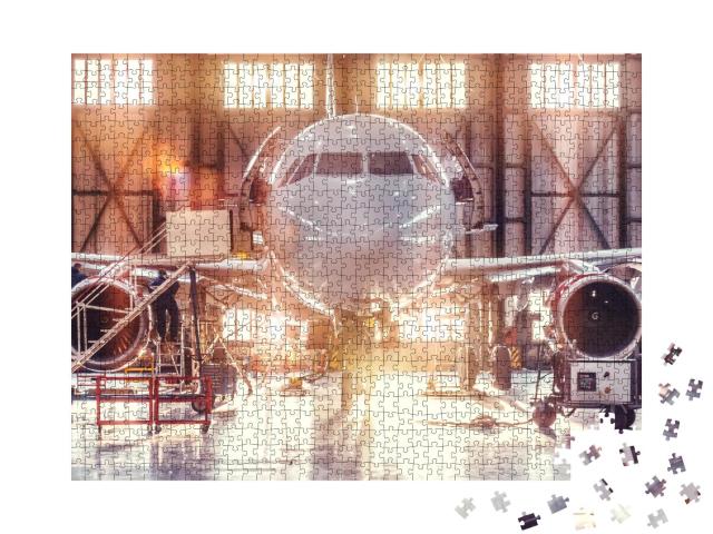 Puzzle 1000 Teile „Flugzeugreparatur im Hangar“