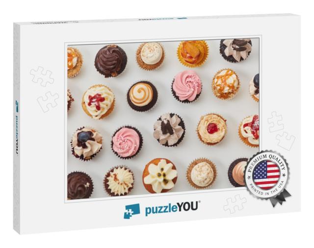 Lots of Assorted Colorful Cupcakes from Above with Toppin... Jigsaw Puzzle