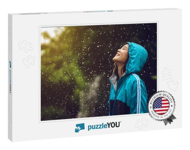 Asian Woman Wearing a Raincoat Outdoors. She is Happy... Jigsaw Puzzle
