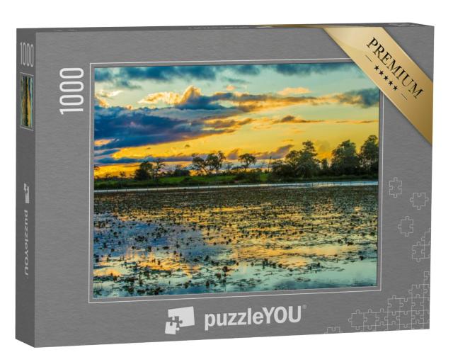 Puzzel 1000 stukjes „Kleurrijke zonsondergang boven de Pantanal, Brazilië“