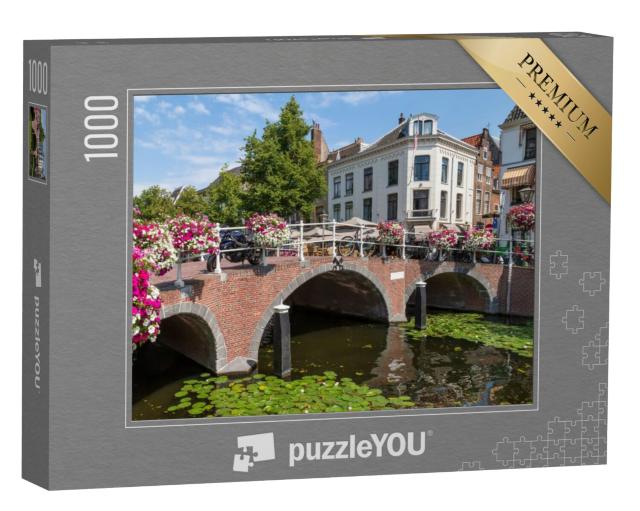 Puzzel 1000 stukjes „Grachtenbrug en grachtenpanden in het centrum van de Nederlandse universiteitsstad Leiden“