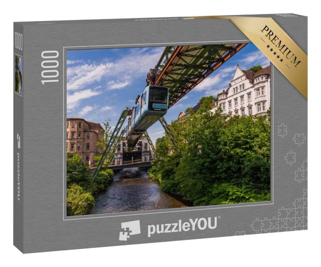 Puzzle 1000 Teile „Die Schwebende Straßenbahn in Wuppertal“