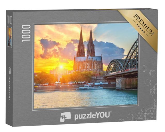 Puzzel 1000 stukjes „Uitzicht op de Dom van Keulen in de gouden zonsondergang“