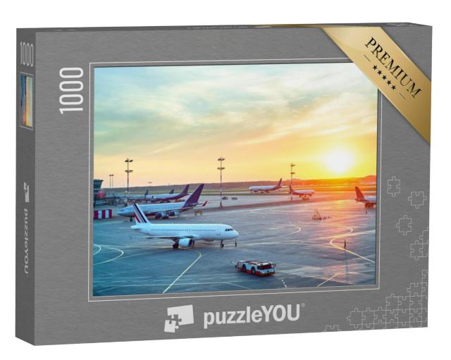 Puzzel 1000 stukjes „Vliegveld in een prachtige zonsondergang“