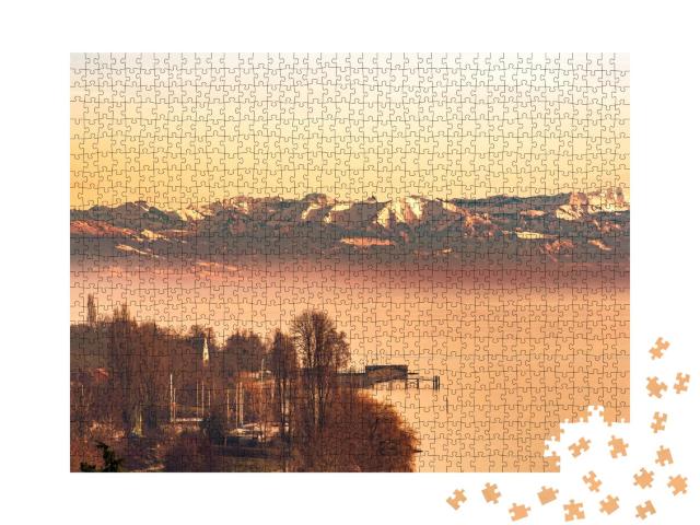 Puzzle 1000 Teile „Abendleuchten am Bodensee mit Schweizer Alpen“
