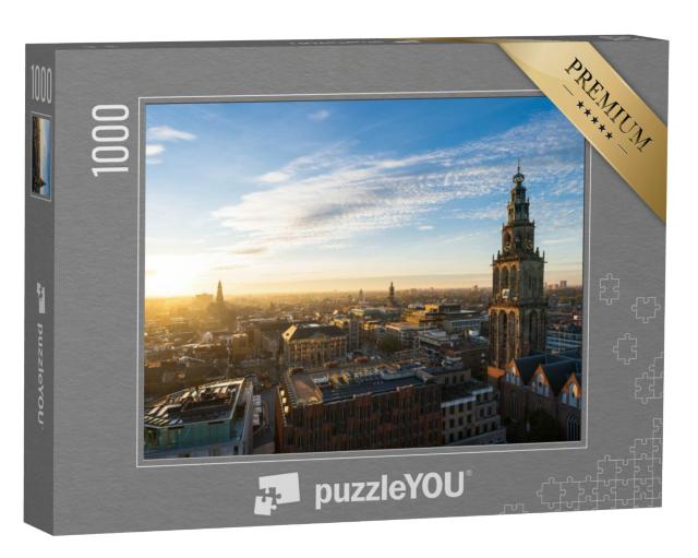 Puzzel 1000 stukjes „De zonsondergang bij de Martinitoren en de historische binnenstad van Groningen“