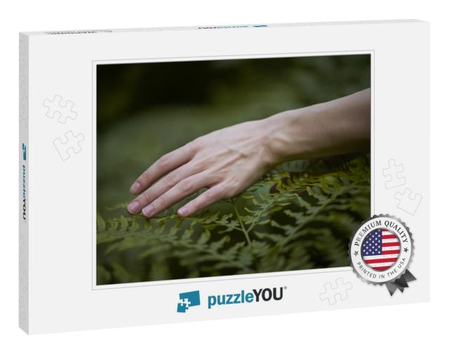 A Thin Female Hand Touches the Carved Fern Leaves... Jigsaw Puzzle