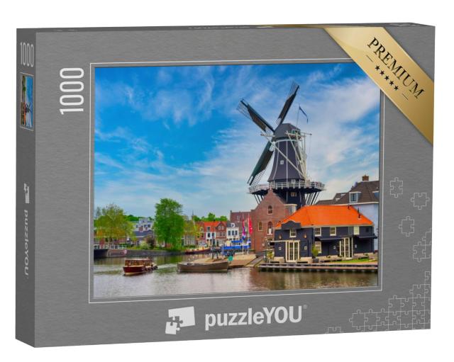 Puzzel 1000 stukjes „Een windmolen langs de grachten in Haarlem, Nederland“