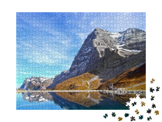 Puzzle 1000 Teile „Eiger, Mönch und Jungfrau, berühmtes Dreigestirn der Berner Alpen“