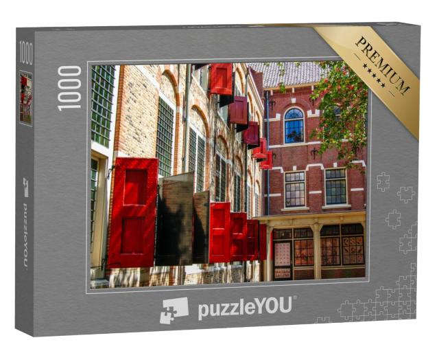 Puzzel 1000 stukjes „Raam met rode luiken. Het weeshuis, Gouda Nederland.“