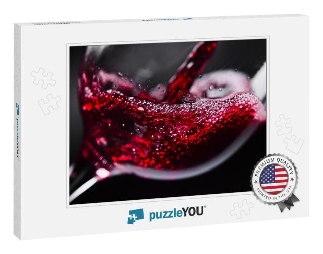 Red Wine in Wineglass on Black Background... Jigsaw Puzzle