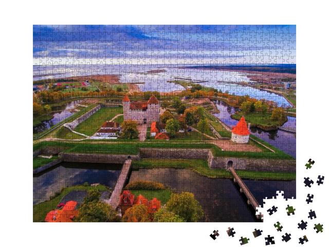 Puzzle 1000 Teile „Luftaufnahme der Stadt Saaremaa mit der Burg in der Mitte“