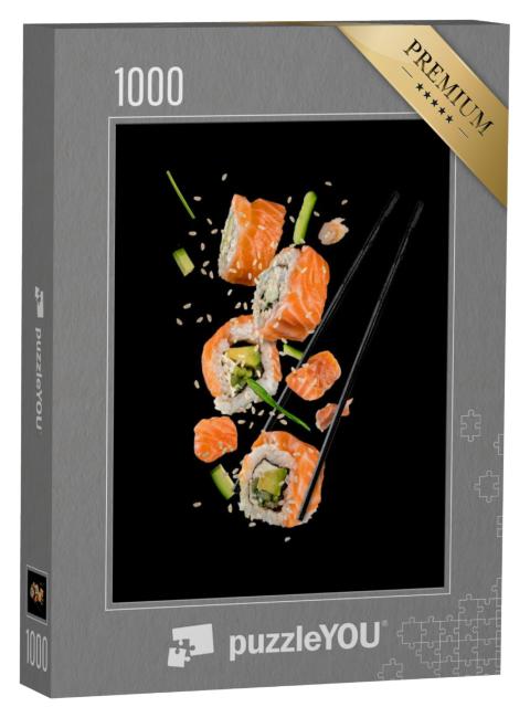 Puzzel 1000 stukjes „Sushi rollen tussen stokjes“