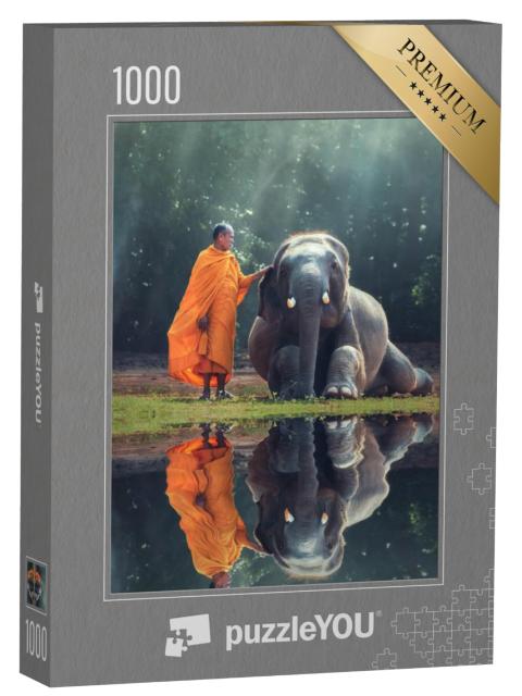 Puzzel 1000 stukjes „Monnik en baby olifant“