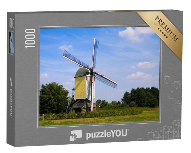 Puzzel 1000 stukjes „Houten windmolen voor een blauwe lucht Nederland, Baexem“