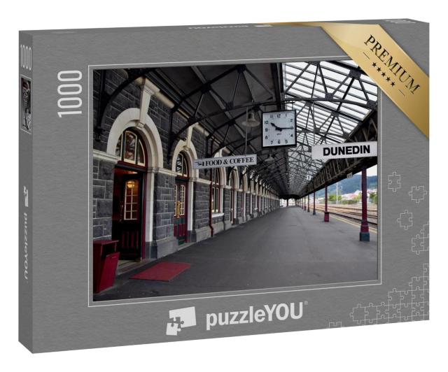 Puzzle 1000 Teile „Morgens um 10.15 Uhr ist der Bahnhof von Dunedin leer“