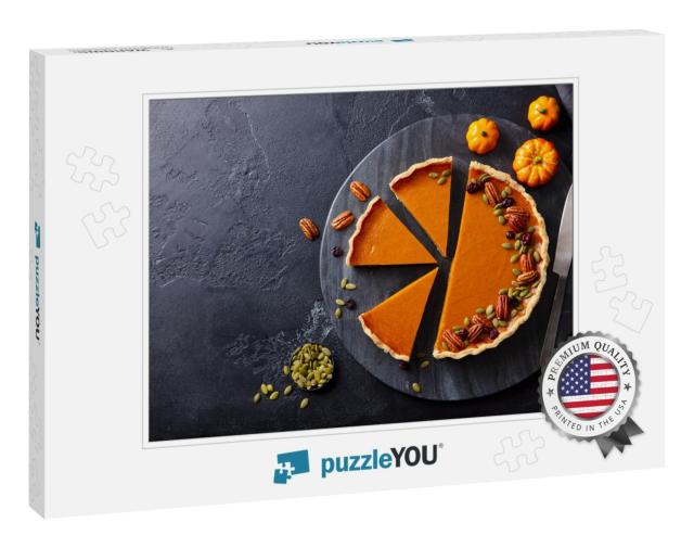Pumpkin Pie on Marble Cutting Board. Dark Background. Cop... Jigsaw Puzzle