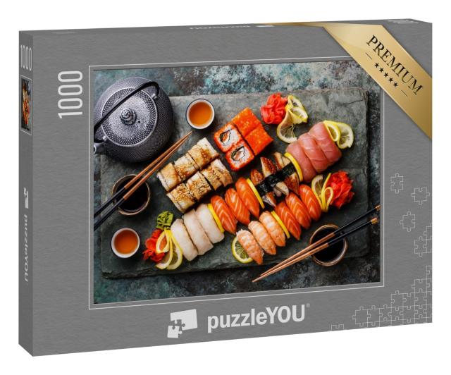 Puzzle 1000 Teile „Sushi-Set Nigiri und Sushi-Rollen mit Tee serviert auf grauem Schiefer “