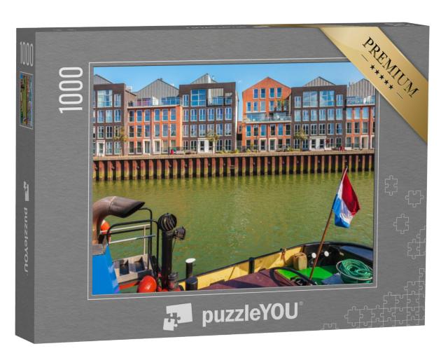 Puzzel 1000 stukjes „Hedendaagse huizen in Dordrecht, met een oude sleepboot op de voorgrond“