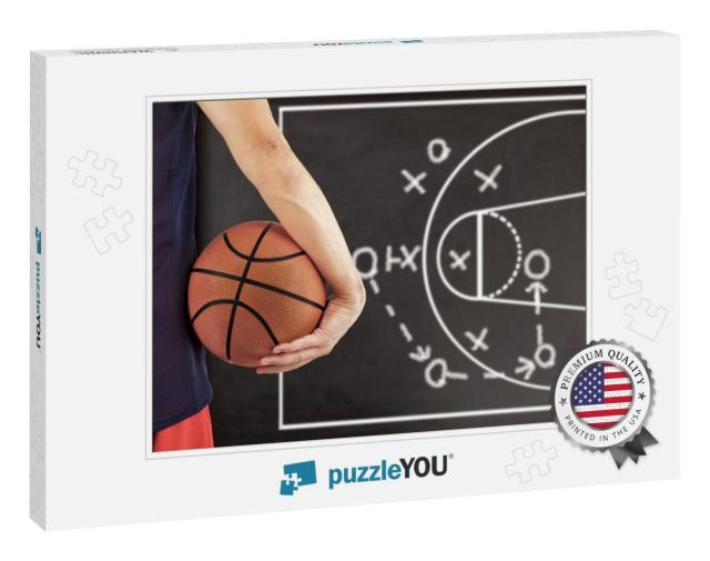 Cropped Image of a Young Man Holding a Basketball Ball wi... Jigsaw Puzzle