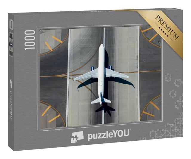 Puzzle 1000 Teile „Blick von oben: Schmalrumpfflugzeug auf der Landebahn“