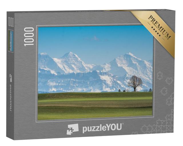 Puzzel 1000 stukjes „Boom voor de Eiger, Mönch en Jungfrau op een mooie lentedag“