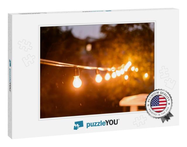Decorative Outdoor String Lights Hanging on the Tree in t... Jigsaw Puzzle