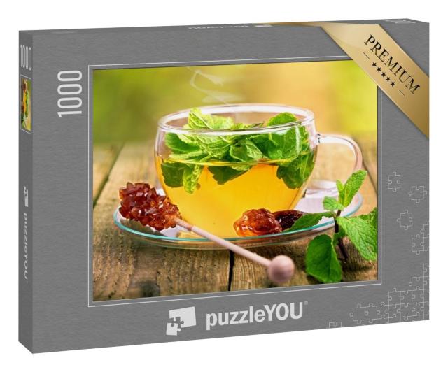 Puzzle 1000 Teile „Tee in Glastasse mit Minzblatt und braunem Rohrzucker“