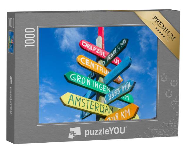 Puzzel 1000 stukjes „Kleurrijke wegwijzer naar verschillende steden in Appingedam, Nederland“