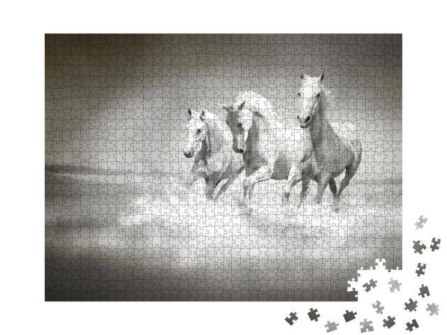 Puzzle 1000 Teile „Herde weißer Pferde, die durch Wasser laufen“