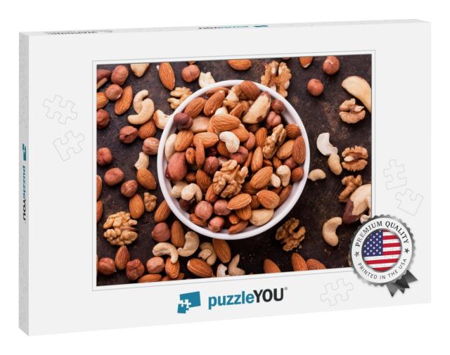 Mixed Nuts on Dark Background. Healthy Food & Snack. Top... Jigsaw Puzzle