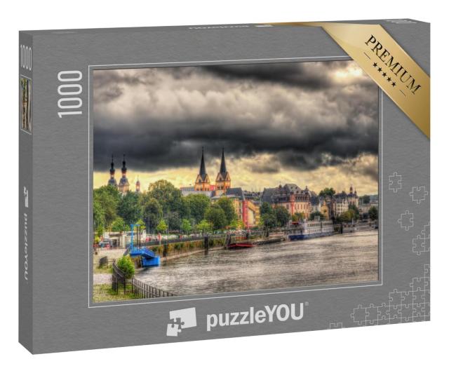 Puzzle 1000 Teile „Koblenzer Deich unter dunklen Regenwolken“