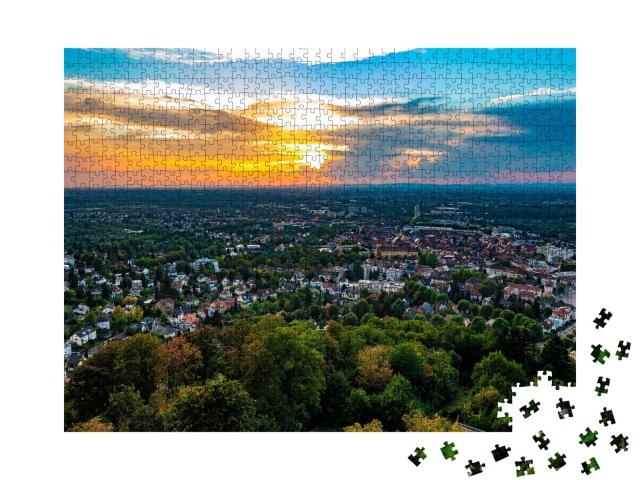 Puzzle 1000 Teile „Sturmwolken im Sonnenuntergang über Karlsruhe“
