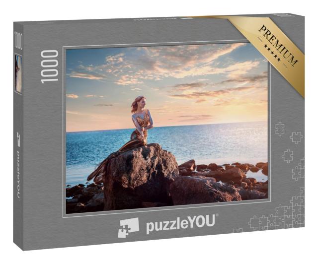 Puzzle 1000 Teile „Bezaubernde Meerjungfrau auf einem Felsen im Sonnenuntergang“