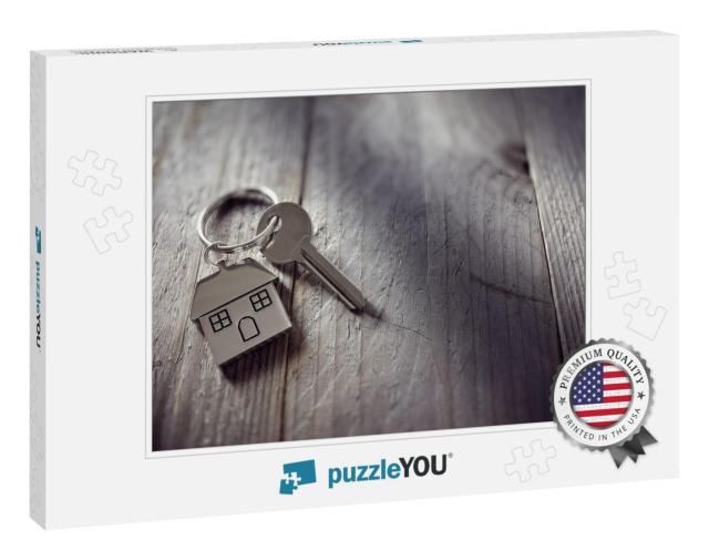 House Key on a House Shaped Keychain Resting on Wo... Jigsaw Puzzle